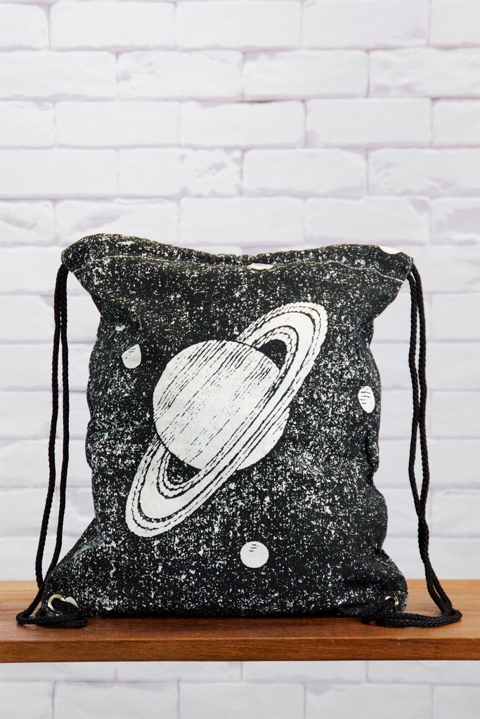 Drawstring Backpack | Saturn - backpack, black and white, book bag, canvas, drawing, drawstring, gymsack, hand printed, jupiter, outer space, PLANET, planets, space - Wander Emporium