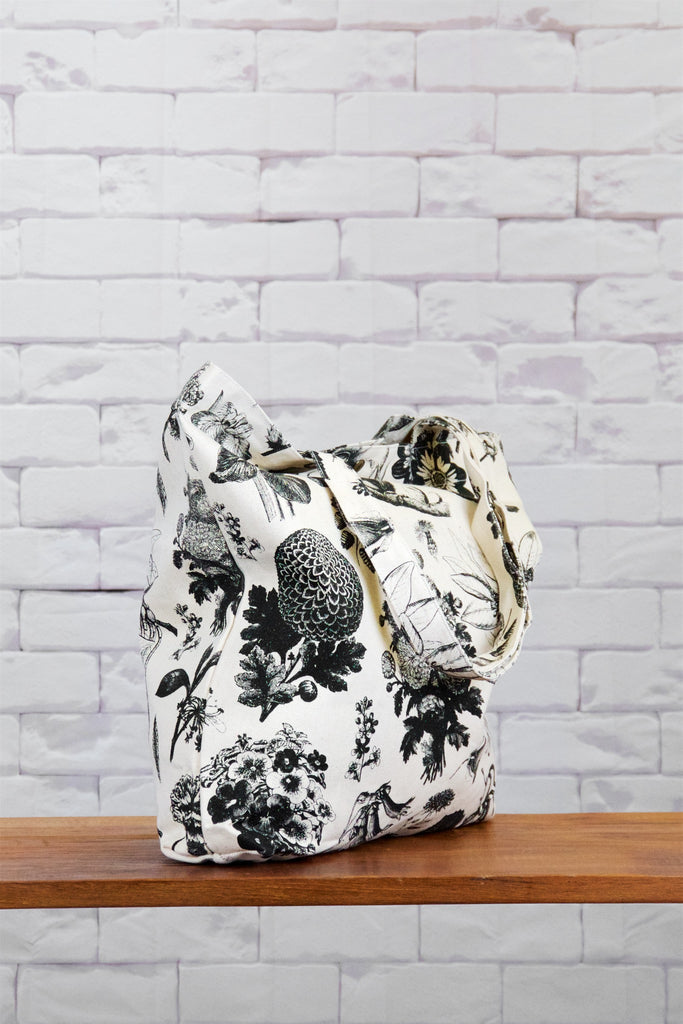Shopper Bag |  Wild Blooms - bag, beach bag, black and white, blooms, drawing, flowers, hand printed, nature, Shopper, snap button, Tote, tote bag, travel, wild, wild flowers, wild tropics - Wander Emporium