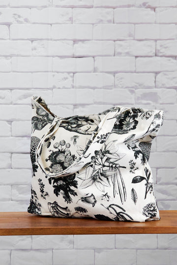 Shopper Bag |  Wild Blooms - bag, beach bag, black and white, blooms, drawing, flowers, hand printed, nature, Shopper, snap button, Tote, tote bag, travel, wild, wild flowers, wild tropics - Wander Emporium