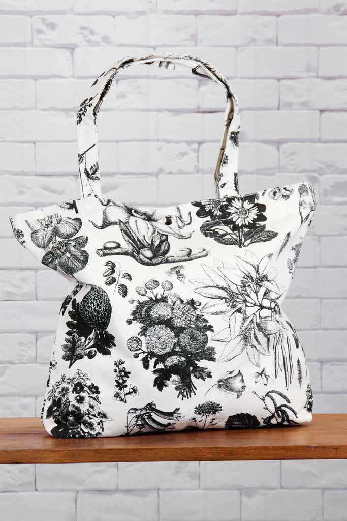 Shopper Bag |  Wild Blooms - bag, beach bag, black and white, blooms, drawing, flowers, hand printed, nature, Shopper, snap button, Tote, tote bag, travel, wild, wild flowers, wild tropics - Wander Emporium